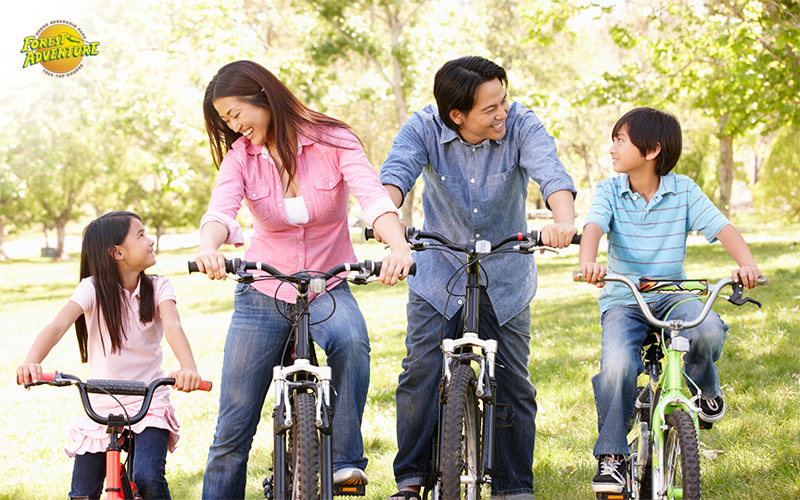 A family cycling at East Coast Park