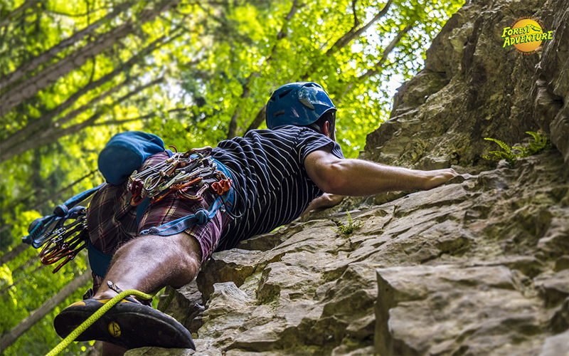 A man during rock climbing as an adventure activity in singapore