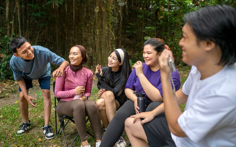 Team members enjoying an outdoor bonding activity in Singapore
